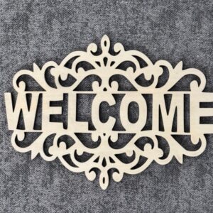Natural wood Welcome sign with intricate symmetrical scrollwork and decorative cutout lettering